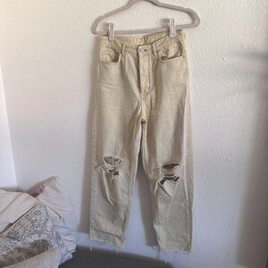 COS distressed light yellow mom jeans